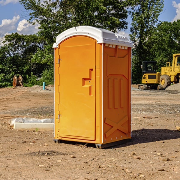 what is the cost difference between standard and deluxe portable restroom rentals in Aurora SD